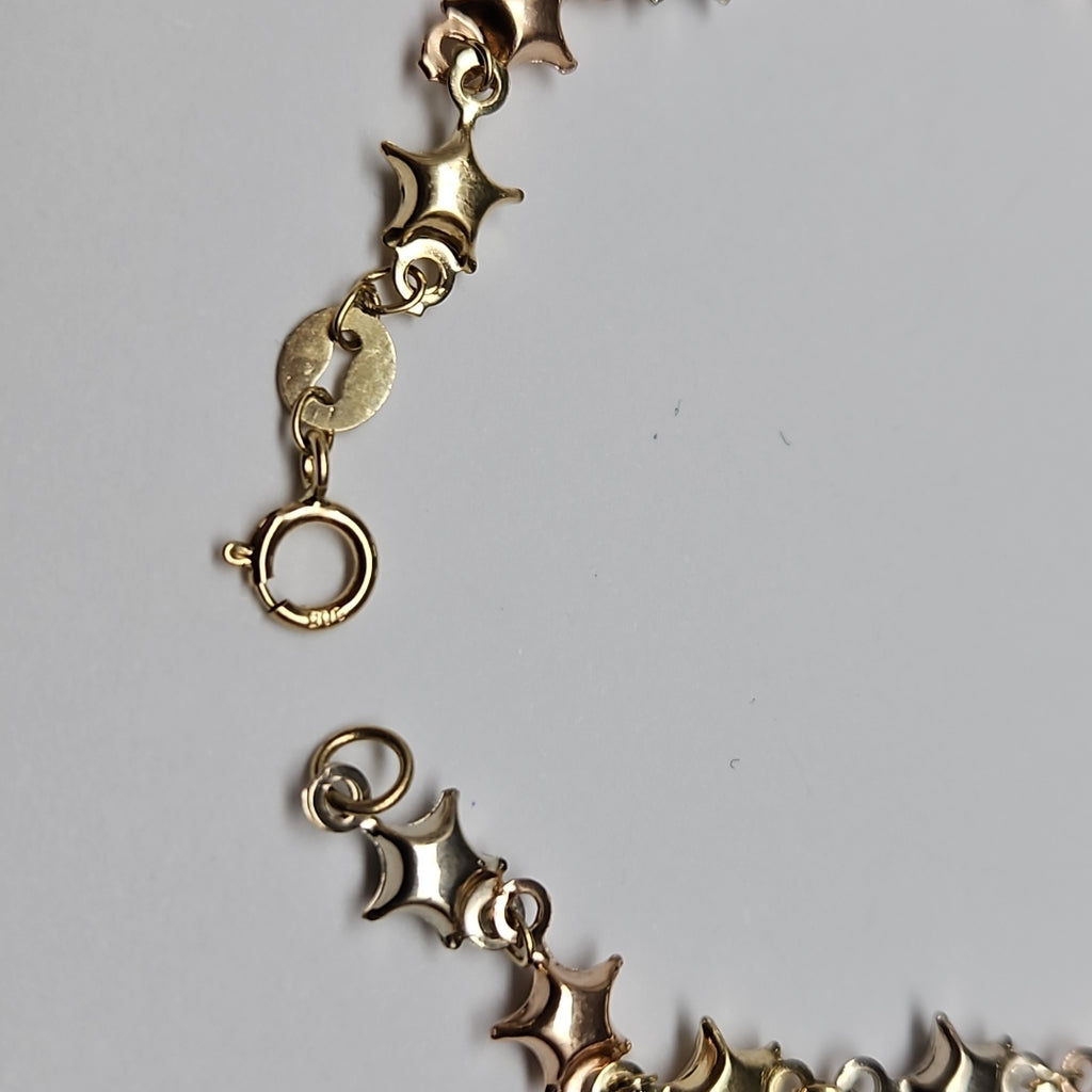 PULSERA TEJIDO ESPECIAL ESTRELLAS COMBINADAS 14K 18 CM 2.3 GR (NUEVO)