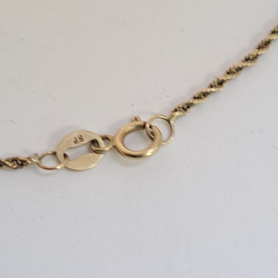 CADENA, DIJE ORO 10 K 1.8 GRMS (SEMINUEVO)