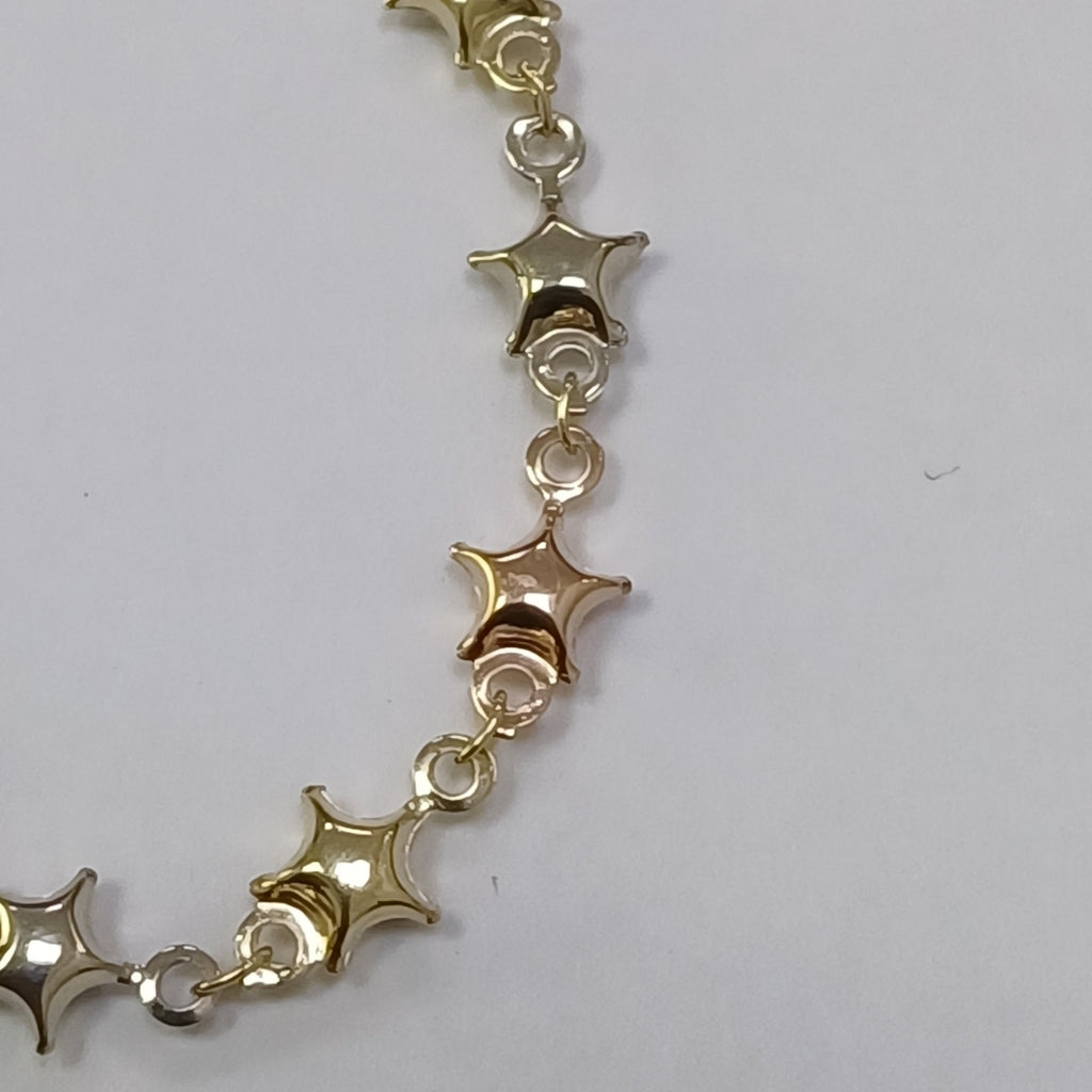 PULSERA TEJIDO ESPECIAL ESTRELLAS COMBINADAS 14K 18 CM 2.3 GR (NUEVO)