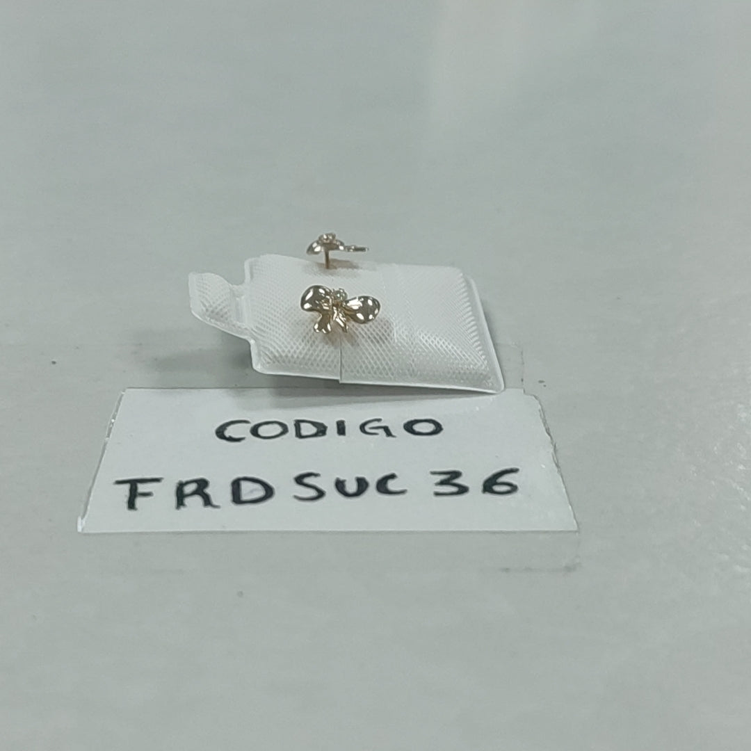 BROQUELES BROQUEL FIG MOÑO C CIRCONIA 14K 0.2441 GR (NUEVO)