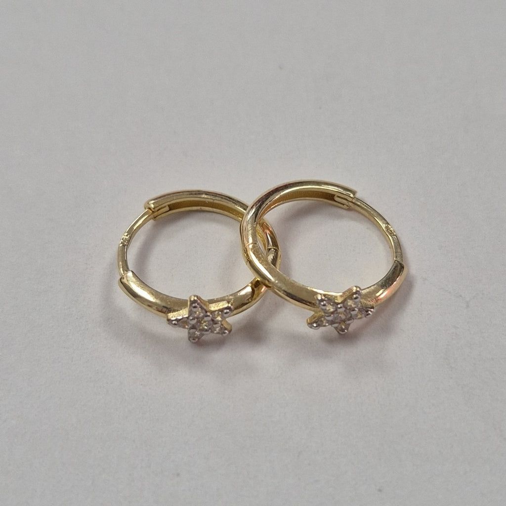 ARETES ARRACADAS FIG ESTRELLA CIRCONIAS 10K 1.6 GR (NUEVO)