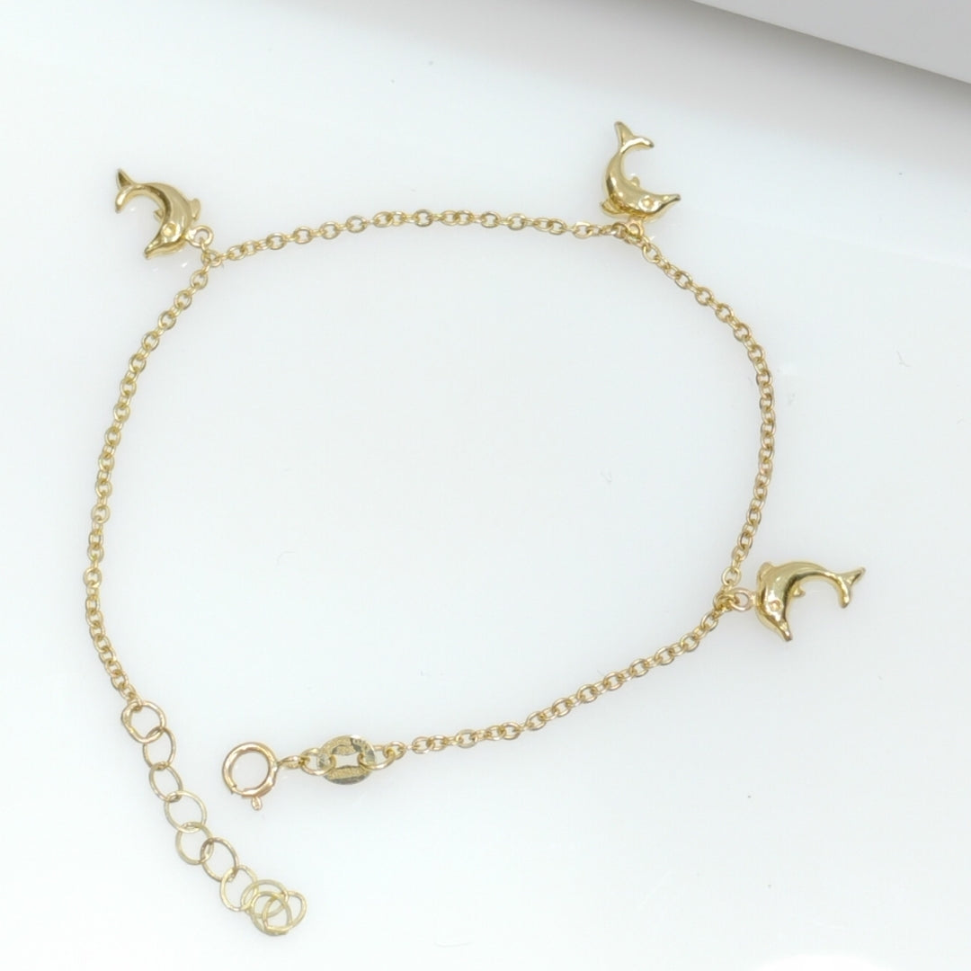 PULSERA ESPECIAL CON DIJES DELFINES 10K 18 CM 2 GR (NUEVO)