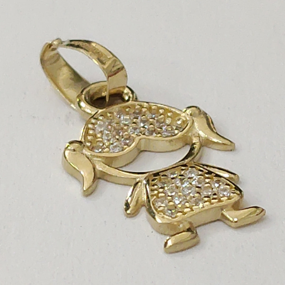 DIJE TEJIDO NIÑA CON CIRCONIAS 14K 0.9 GR (NUEVO)