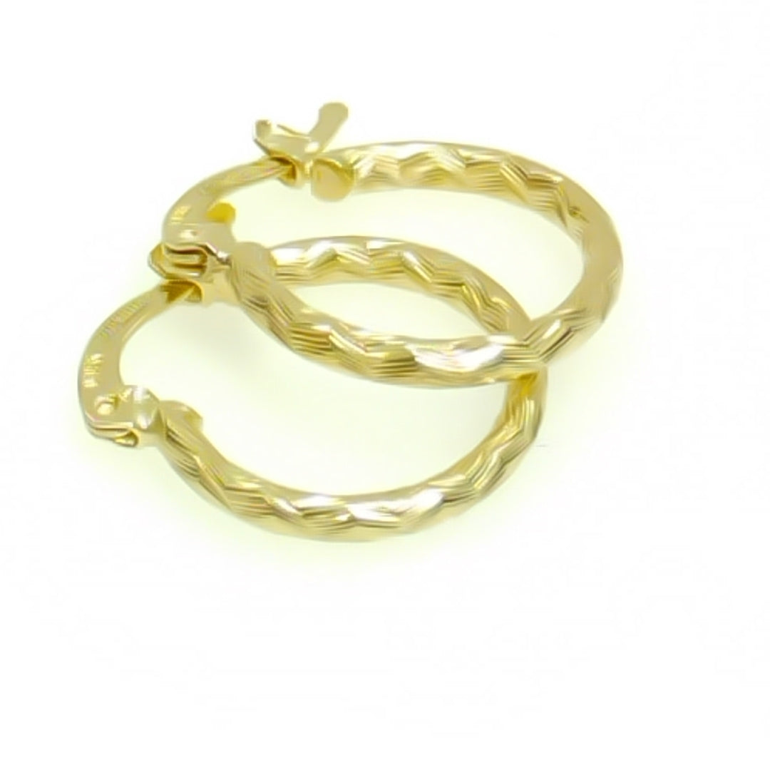 ARETES ARRACADAS TRENZADAS 14K 18 1.6 GR (NUEVO)