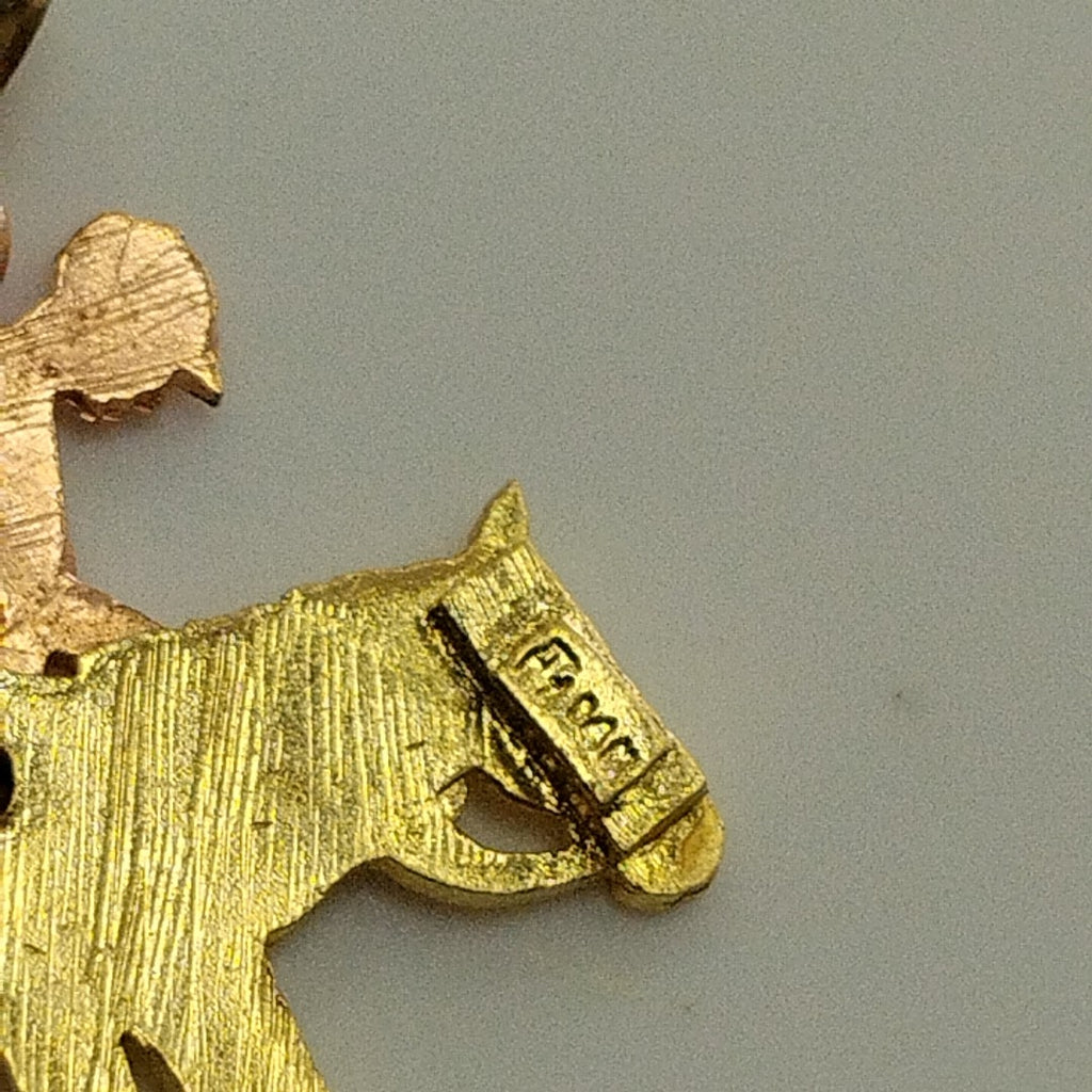 DIJE ORO, ORO COMBINADO 14 K 2.6 GRMS (SEMINUEVO)