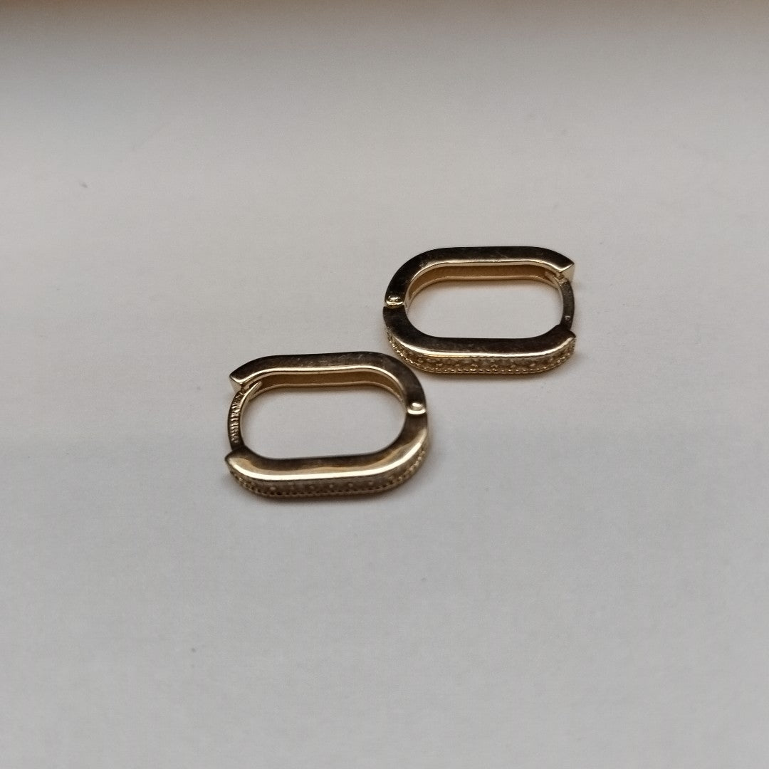 ARETES HUGGIES OVALADA C CIRCONIAS 14K 2.5 GR (NUEVO)