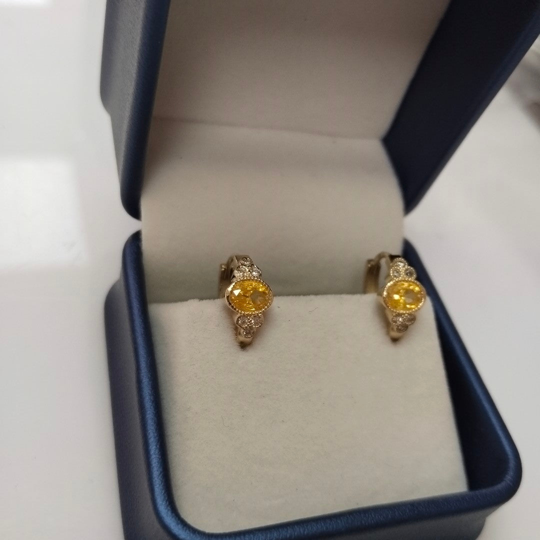 ARETES ARRACADAS CON CIRCONIAS Y PDRAS COL 14K 3.2 GR (NUEVO)