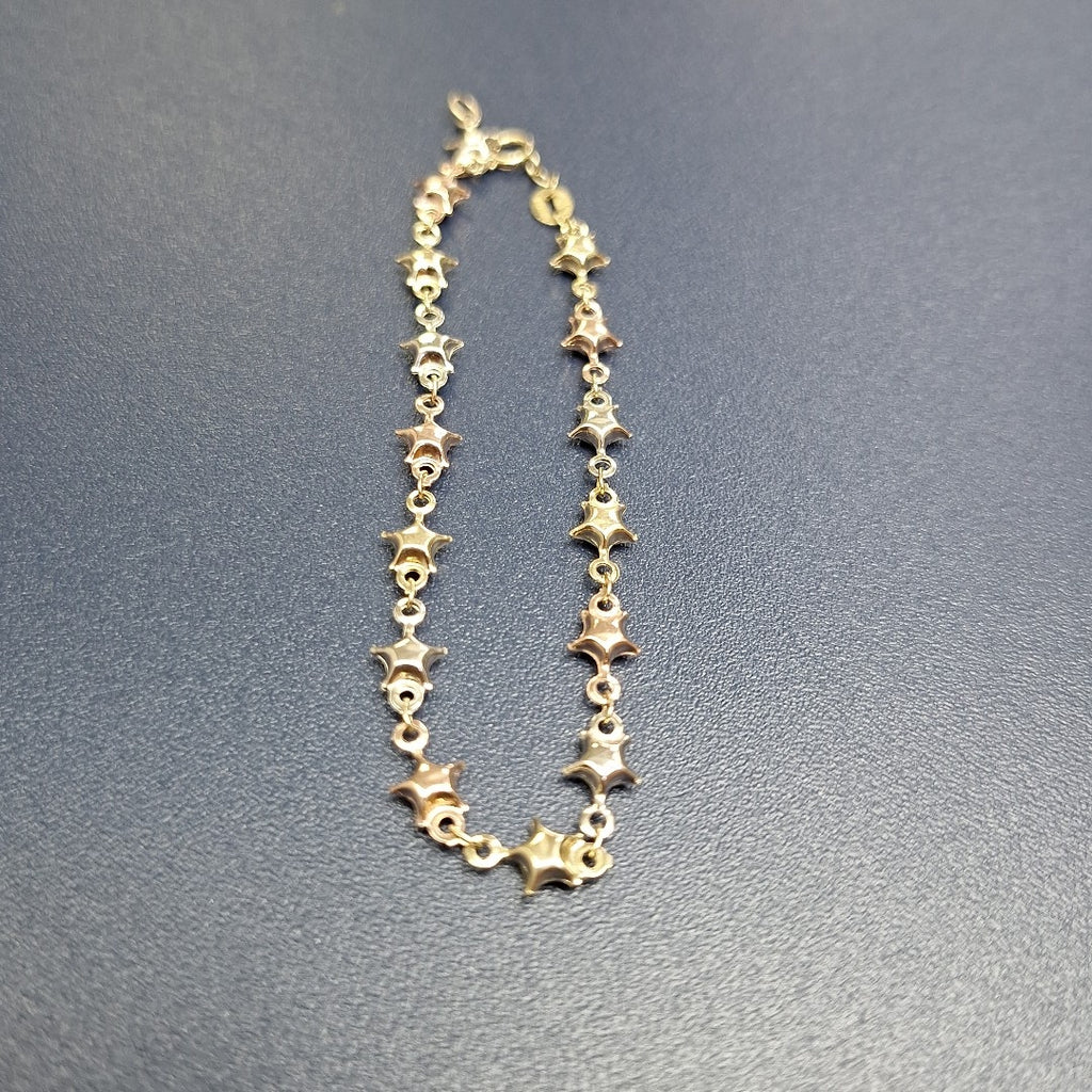 PULSERA TEJIDO ESPECIAL ESTRELLAS COMBINADAS 14K 18 CM 2.3 GR (NUEVO)