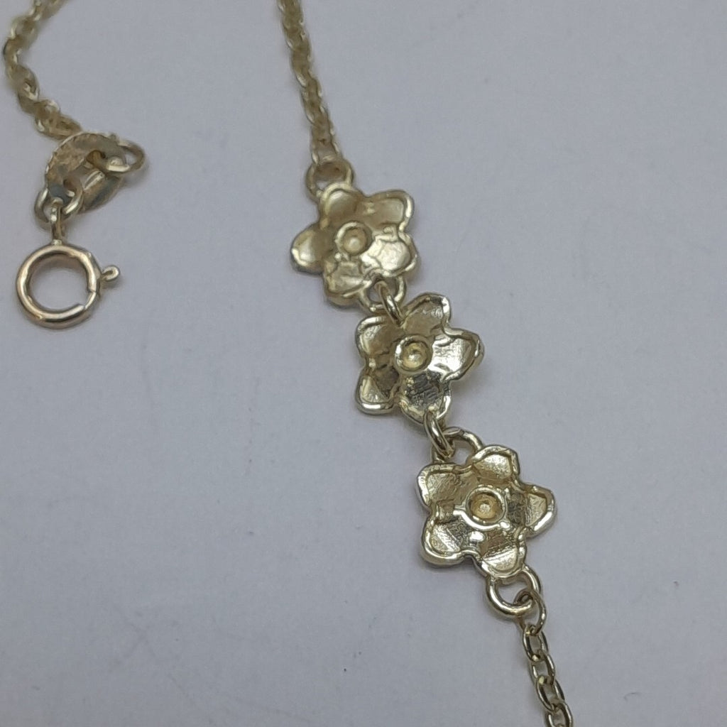 PULSERA TEJIDO ESPECIAL FIG FLORES 14K 18 CM 2.1 GR (NUEVO)