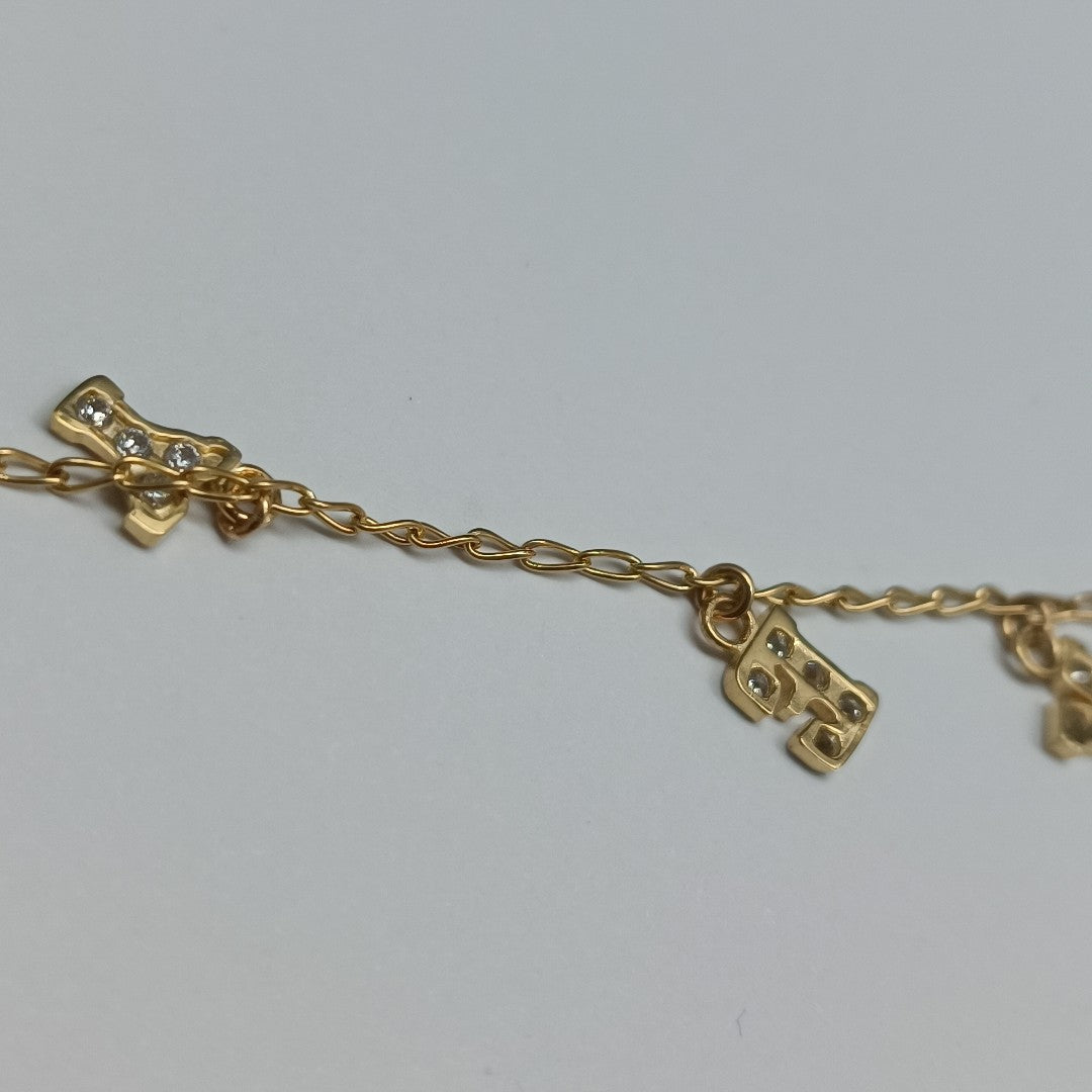 PULSERA ESPECIAL CON DIJES Y CIRCONIAS 14K 18 CM 3.3 GR (NUEVO)