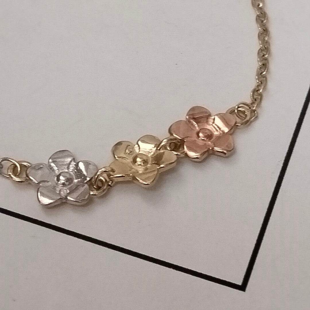 PULSERA TEJIDO ESPECIAL FIG FLORES 14K 18 CM 2.1 GR (NUEVO)