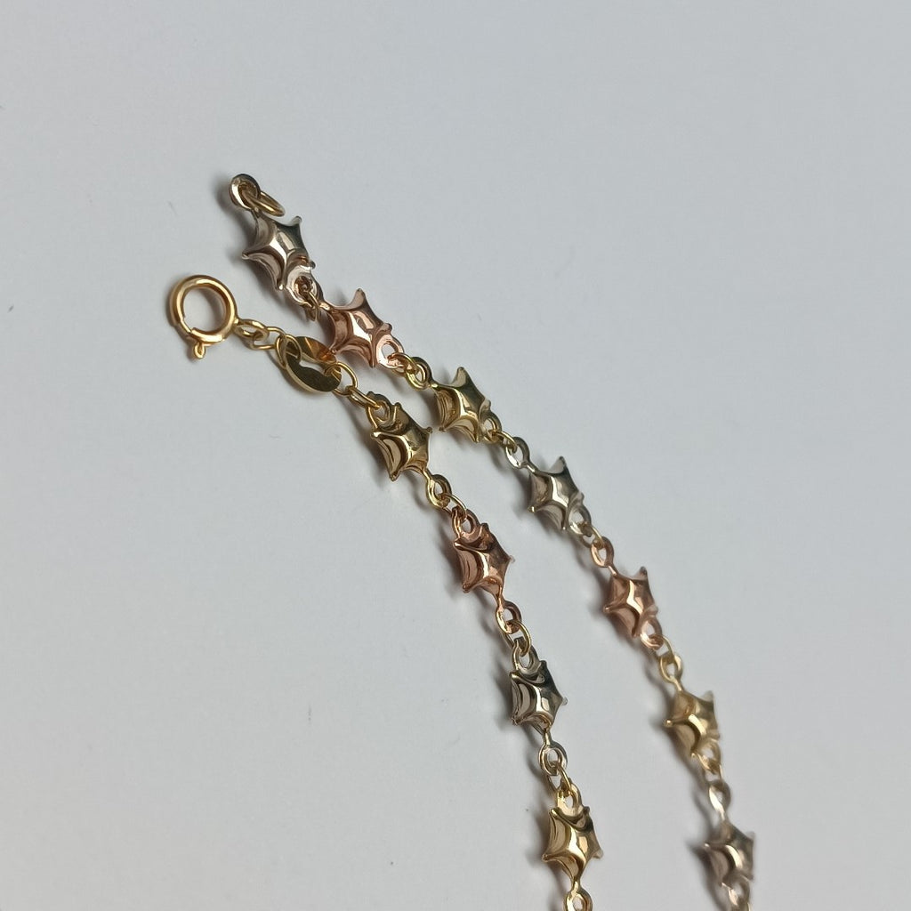 PULSERA TEJIDO ESPECIAL ESTRELLAS COMBINADAS 14K 18 CM 2.4 GR (NUEVO)