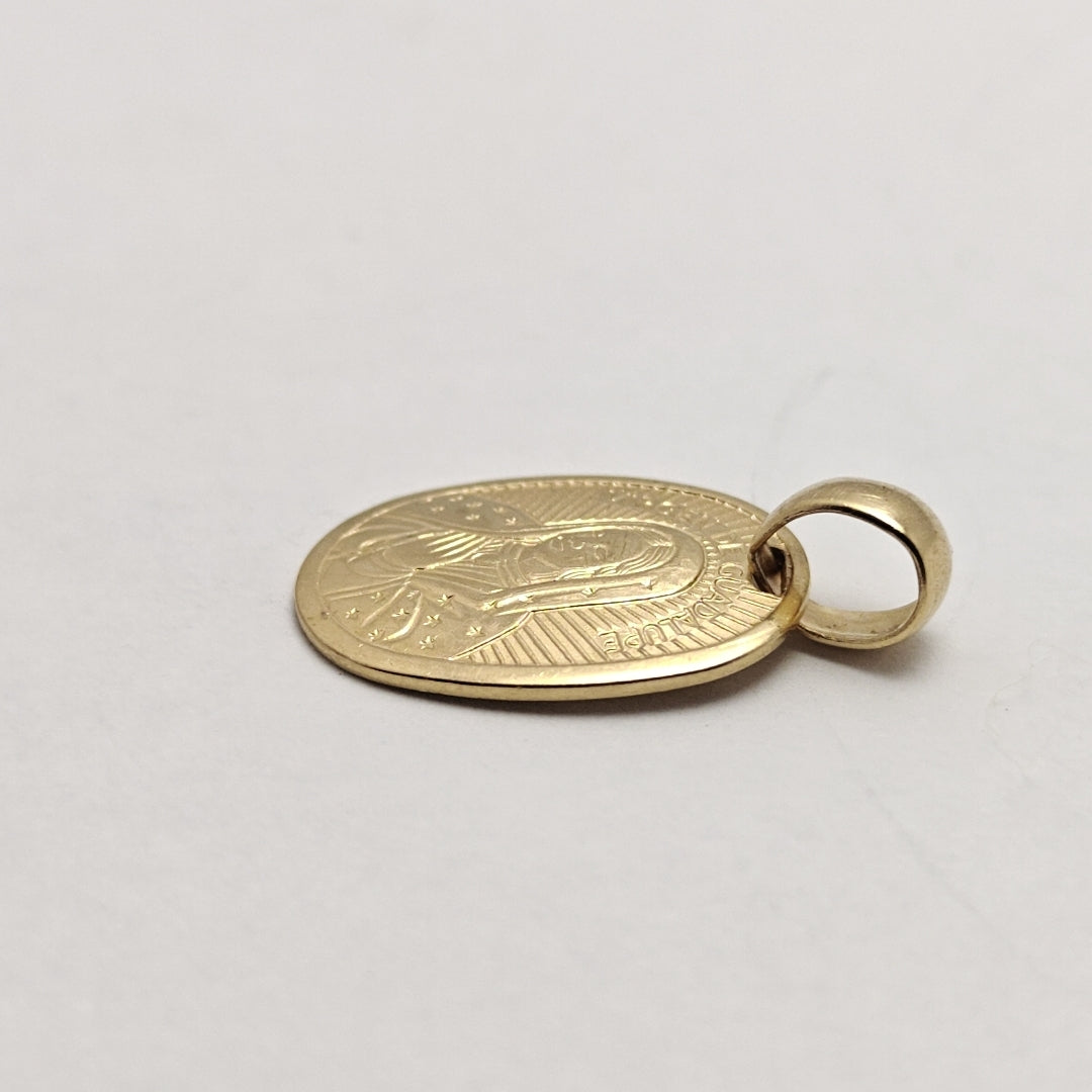 MEDALLA RELIGIOSA ORO 10 K 1.2 GRMS (SEMINUEVO)