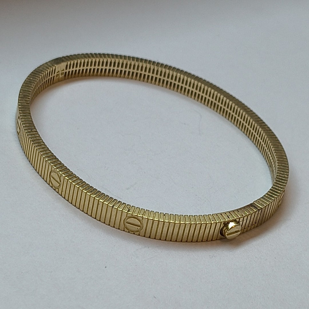 PULSERA RIGIDA ORO 10 K 7.6 GRMS (SEMINUEVO)