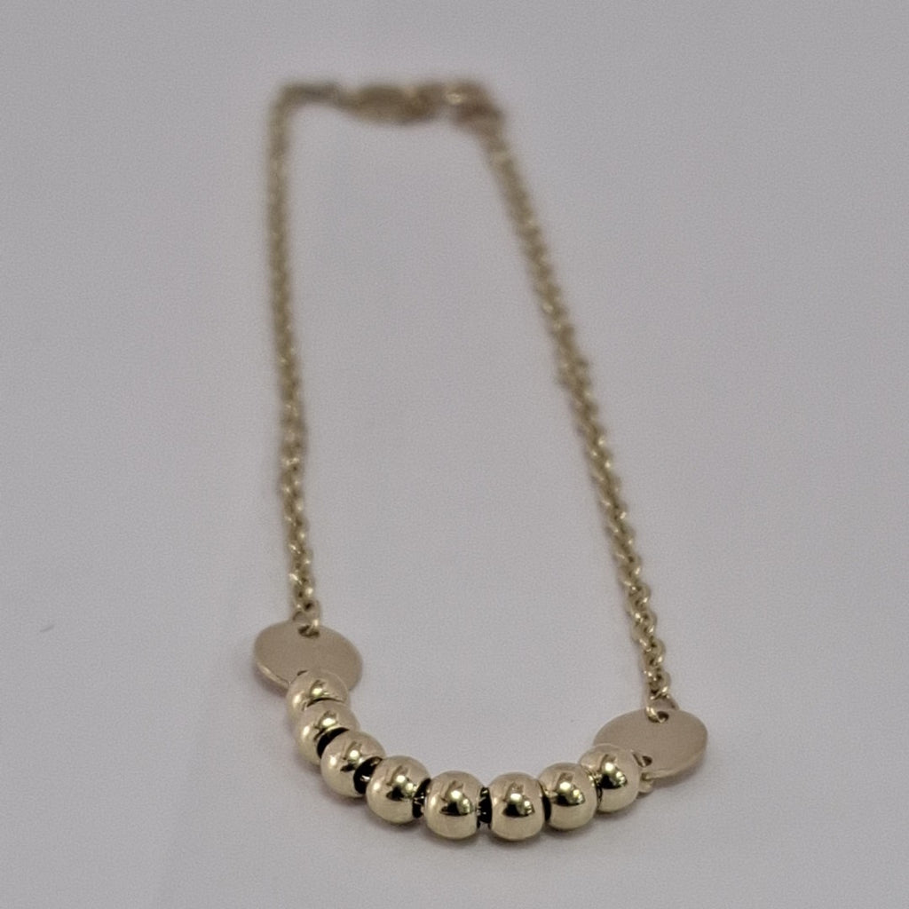 PULSERA TEJIDO ESPECIAL CON BOLITAS 14K 18 CM 1.8 GR (NUEVO)