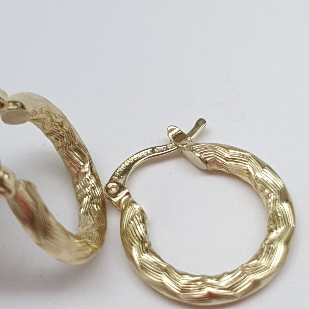 ARETES TEJIDO ARRACADAS ASTRIADAS 14K 1.9 GR (NUEVO)