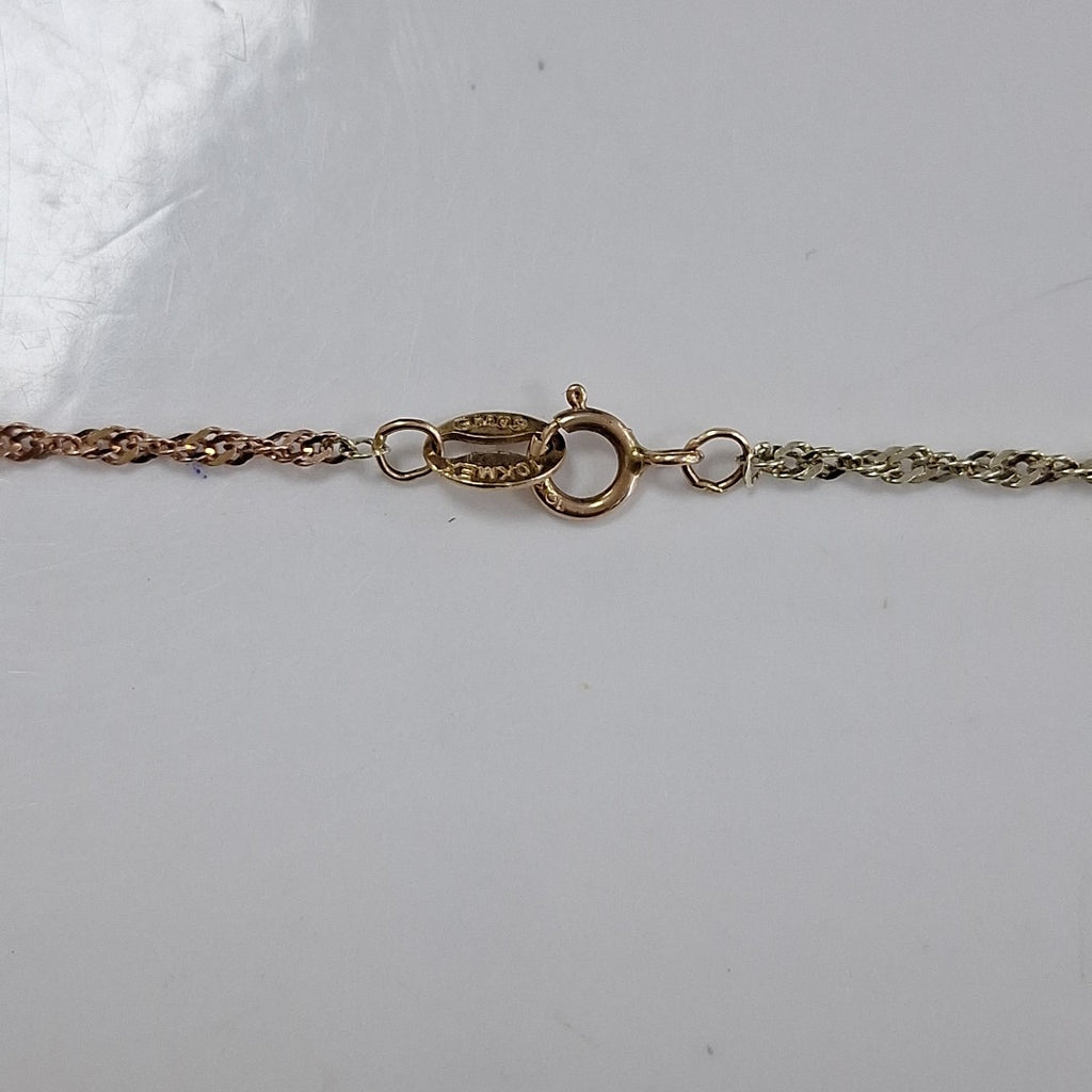 CADENA ORO COMBINADO 10 K 1.2 GRMS (SEMINUEVO)