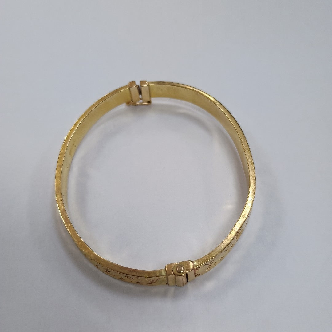PULSERA RIGIDA ORO 10 K 8.3 GRMS (SEMINUEVO)