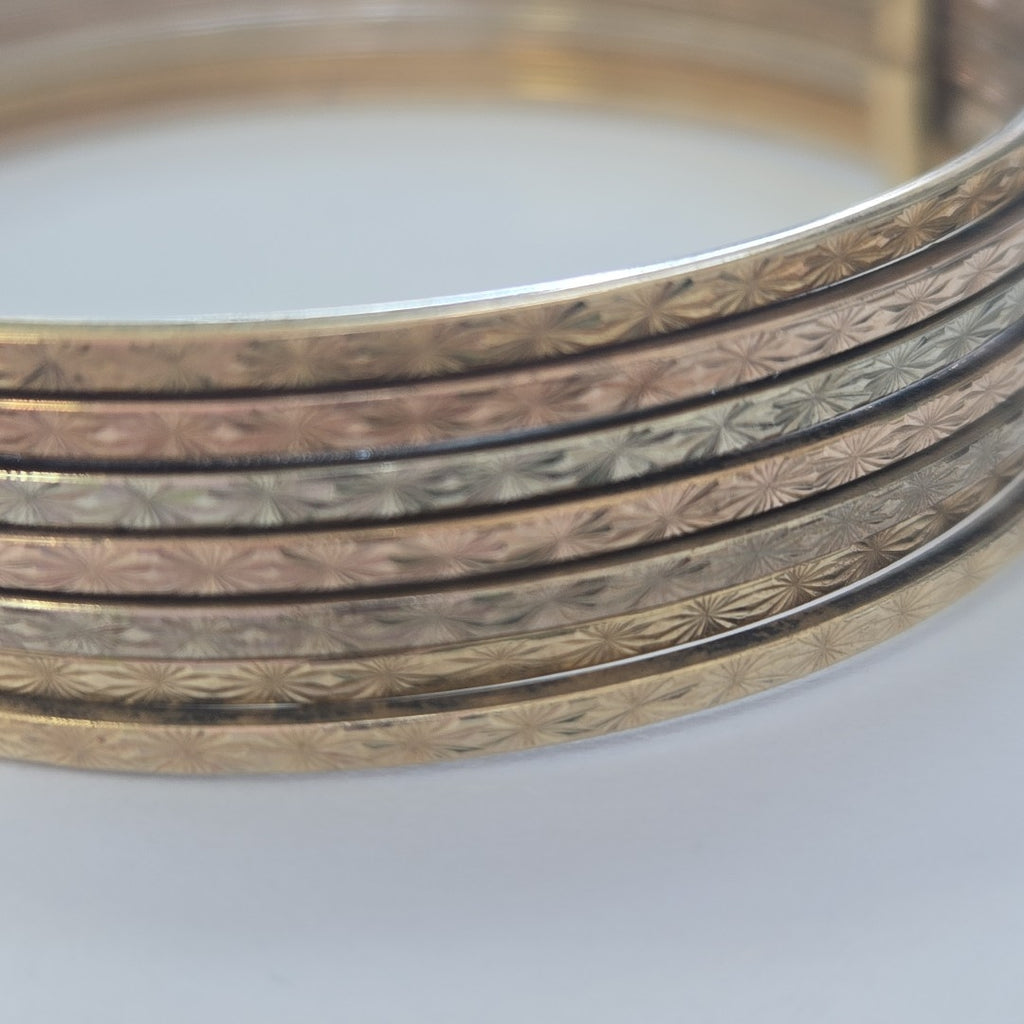 SEMANARIO DE PULSERAS ORO COMBINADO 10 K 22,60 GRMS (SEMINUEVO)