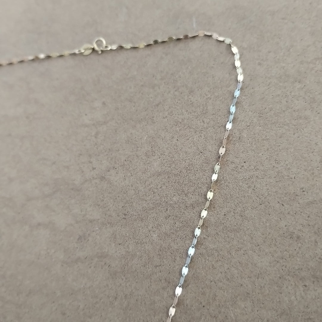 CADENA, DIJE ORO, ORO COMBINADO 10 K 1 GRMS (SEMINUEVO)