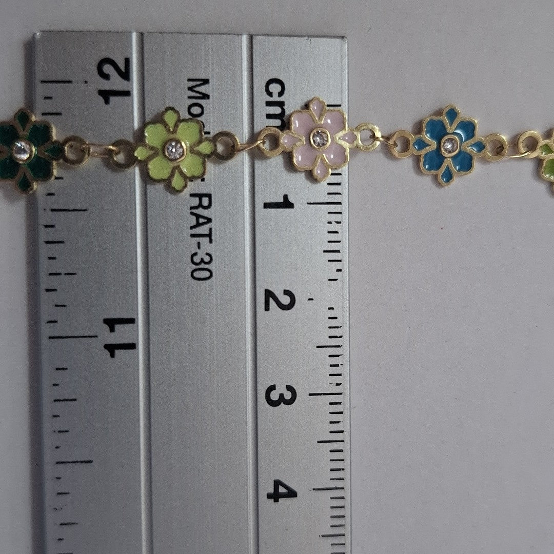 PULSERA ESPECIAL FLORES CON ESMALTE 14K 18 CM 4.7 GR (NUEVO)