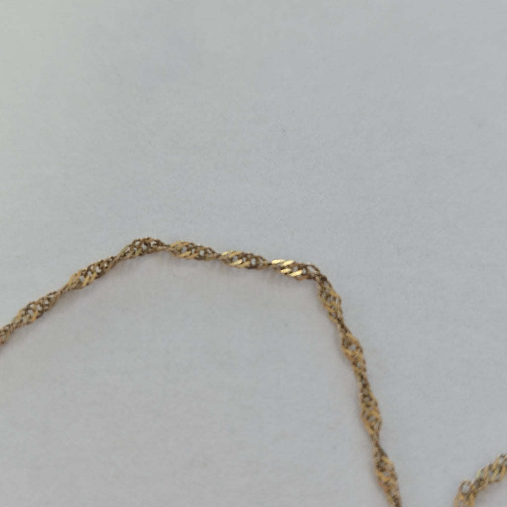 CADENA, DIJE ORO 10 K 2 GRMS (SEMINUEVO)