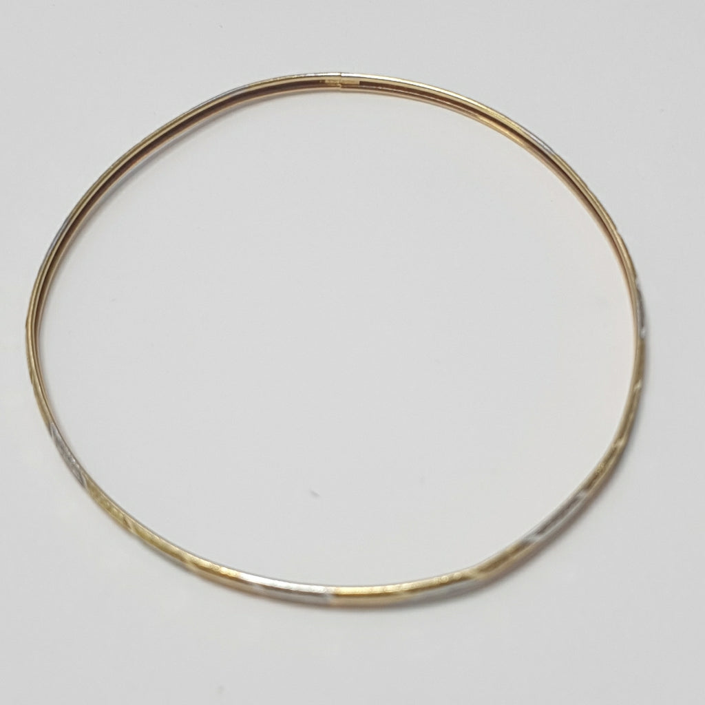 PULSERA RIGIDA ORO COMBINADO 10 K 3,30 GRMS (SEMINUEVO)