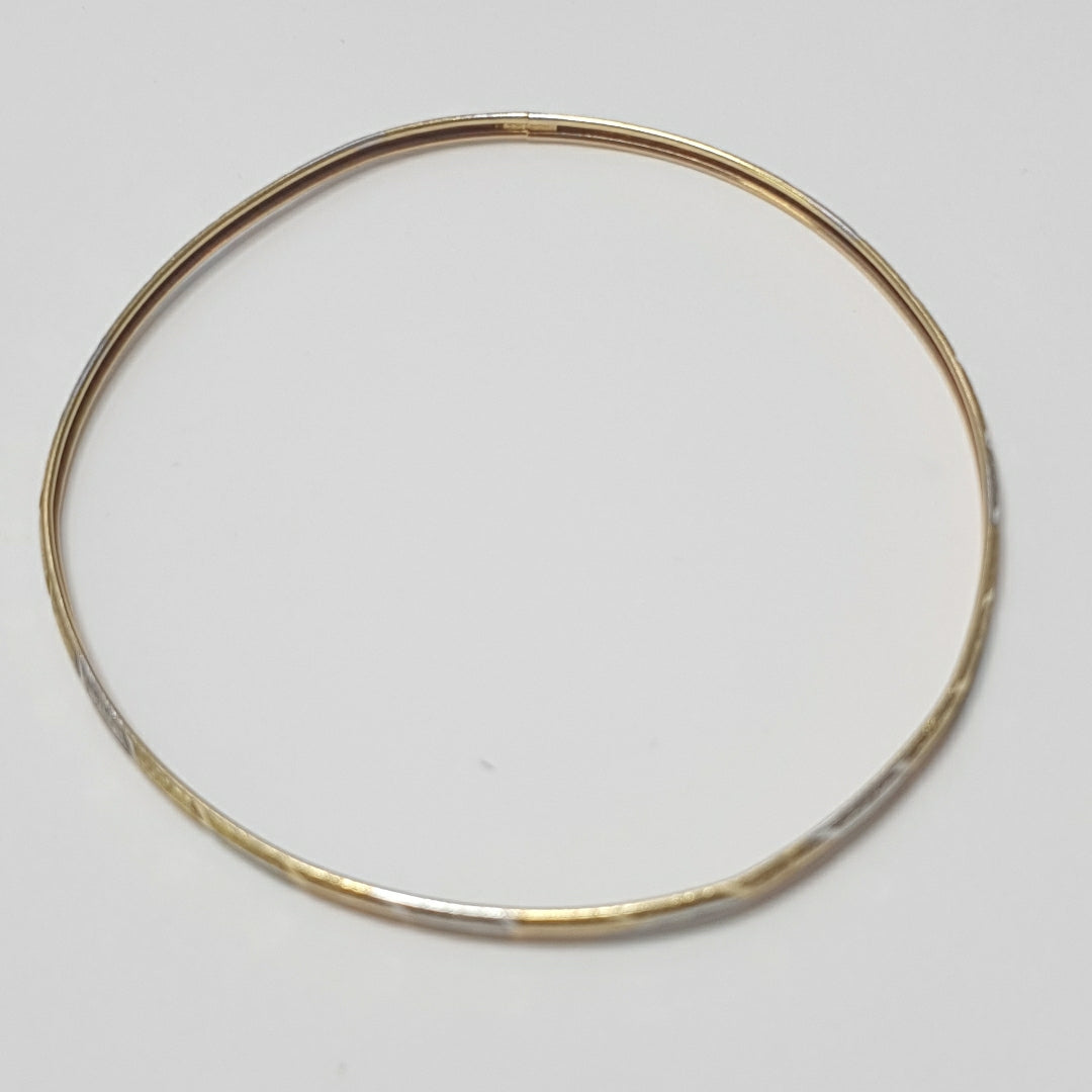 PULSERA RIGIDA ORO COMBINADO 10 K 3,30 GRMS (SEMINUEVO)