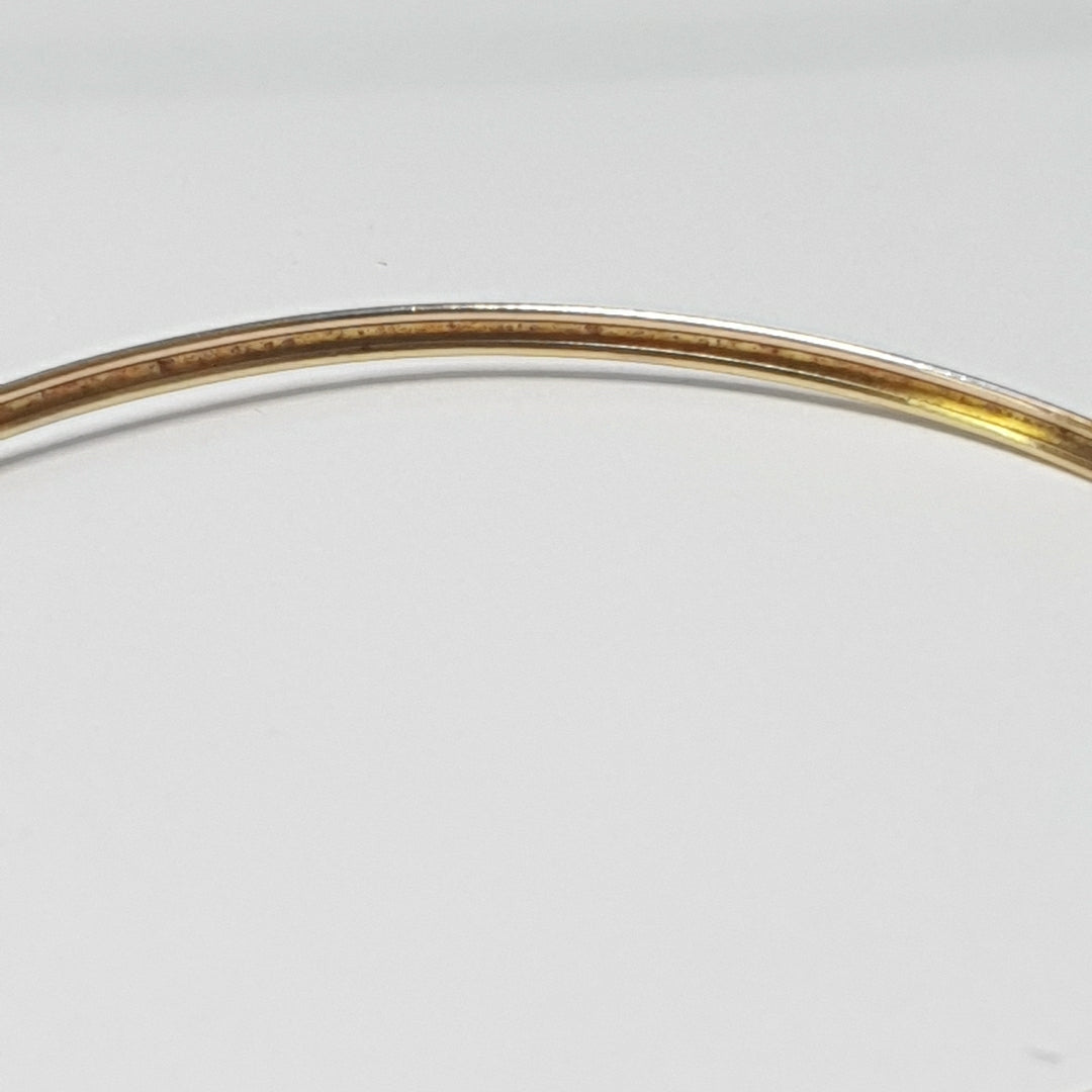 PULSERA RIGIDA ORO COMBINADO 10 K 3,20 GRMS (SEMINUEVO)