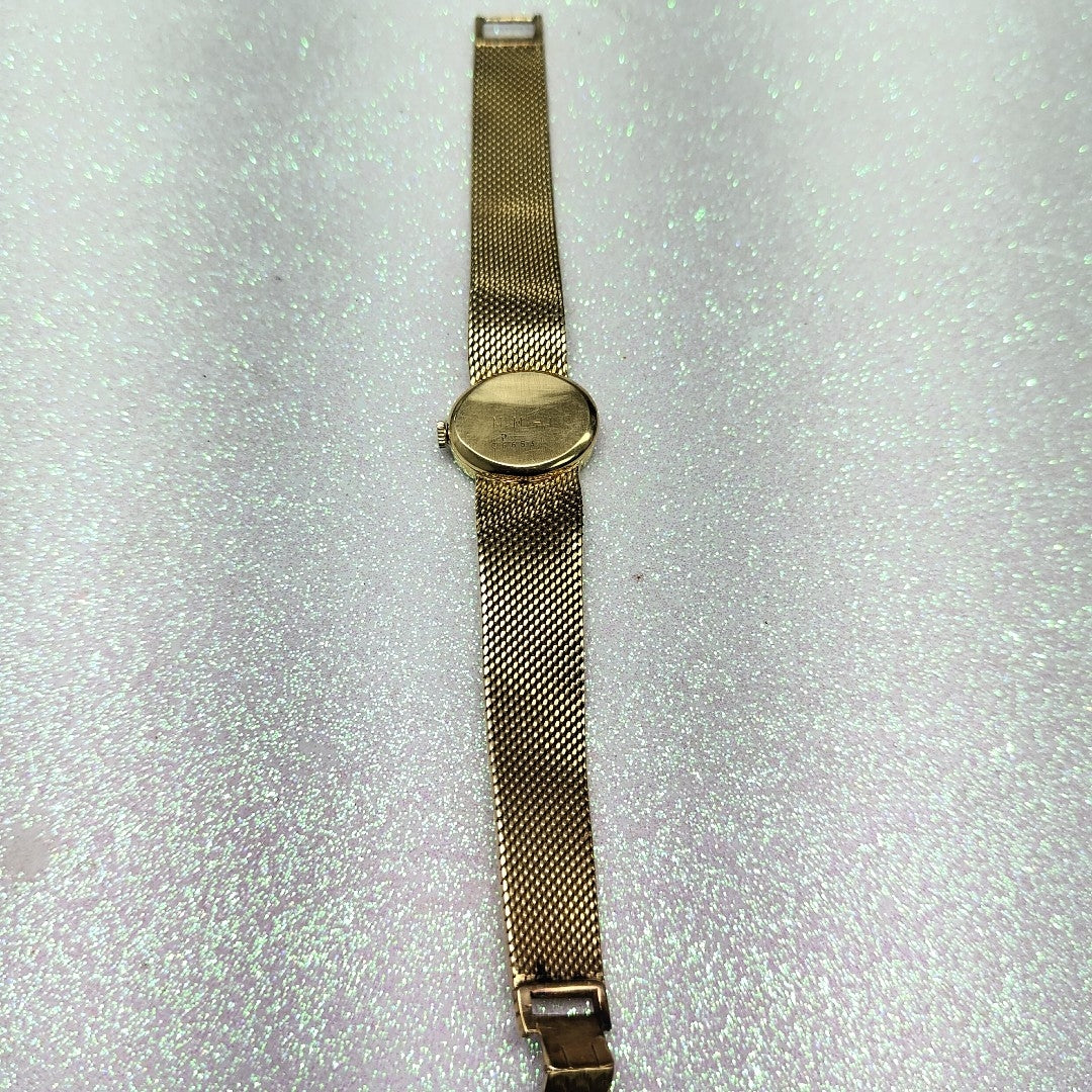 RELOJ CAJA Y PULSO ORO ORO 18 K 42.1 GRMS (SEMINUEVO)