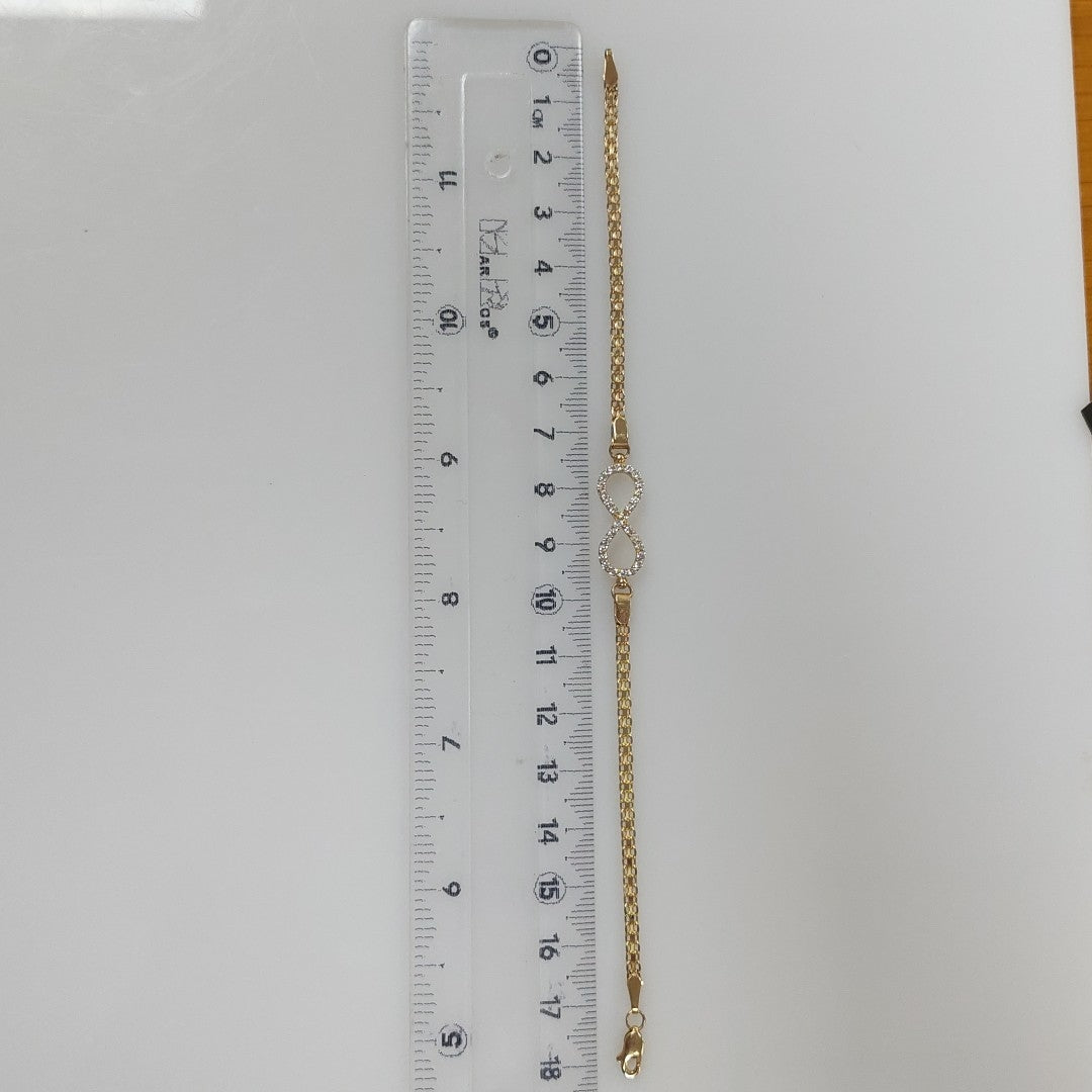 PULSERA TEJIDO ESPECIAL CON INFINITO Y CIRCONIAS 14K 18 CM 3.4 GR (NUEVO)