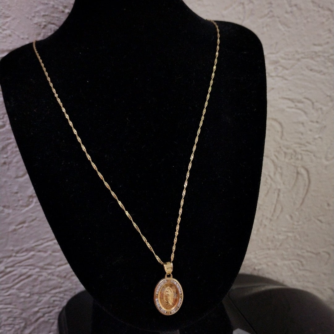 CADENA,MEDALLA RELIGIOSA ORO 10 K 2,10 GRMS (SEMINUEVO)