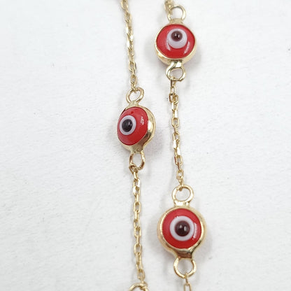 Pulsera para Dama Oro combinado 14 K 1.2 gr Tejido Especial &quot;Ojo turco&quot; con Sintetica color rojo (nuevo)