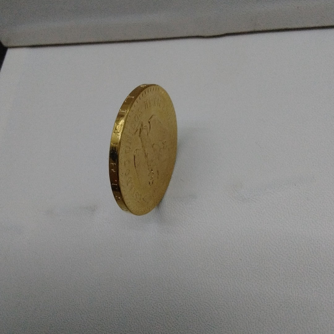 K1 41,60 GRMS - DTO. 0,00 GRMS - 21 K - AVALÚO 59155,20 * IDENTIFICACIÓN  MONEDA NOMINATIVA * MONEDAS PESOS  50 PESOS (SEMINUEVO)