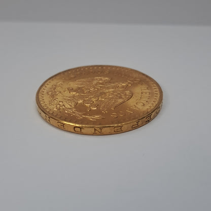 K1 41,60 GRMS - DTO. 0,00 GRMS - 21 K - AVALÚO 79372,80 * IDENTIFICACIÓN  MONEDA NOMINATIVA * MONEDAS PESOS  50 PESOS (SEMINUEVO)