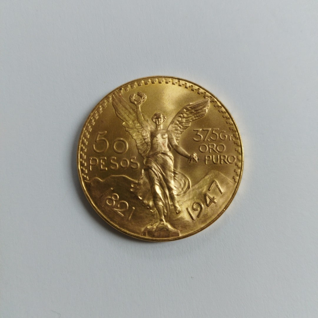 K1 41.6 GRMS - DESC.  0 GRAMOS - 21 K - AVALÚO  67392 * * IDENTIFICACIÓN  MONEDA NOMINATIVA. * MONEDAS PESOS  50 PESOS. (SEMINUEVO)