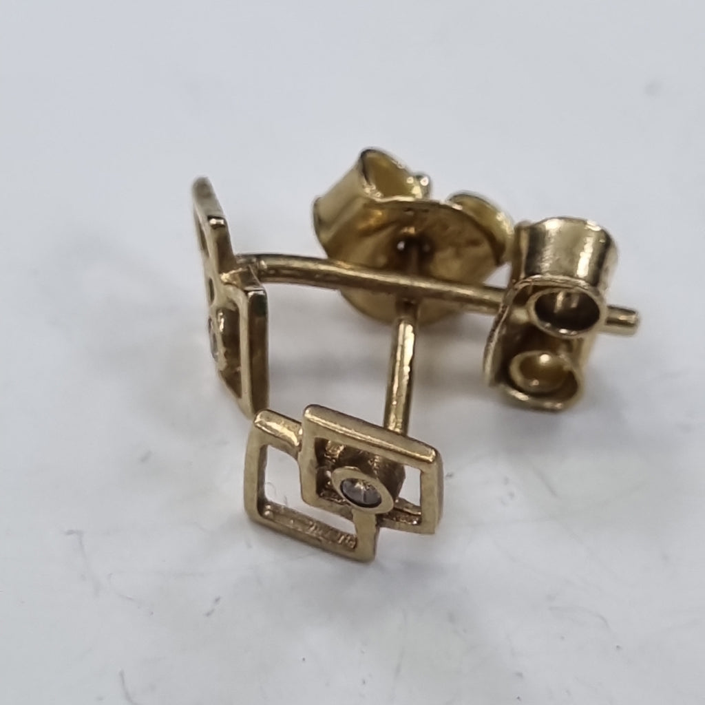 10477BRO00000B1808 FRD12 BROQUEL DE CUADRADOS CON UNA CIRCONIA ORO 14K 0.8GRS (NUEVO)