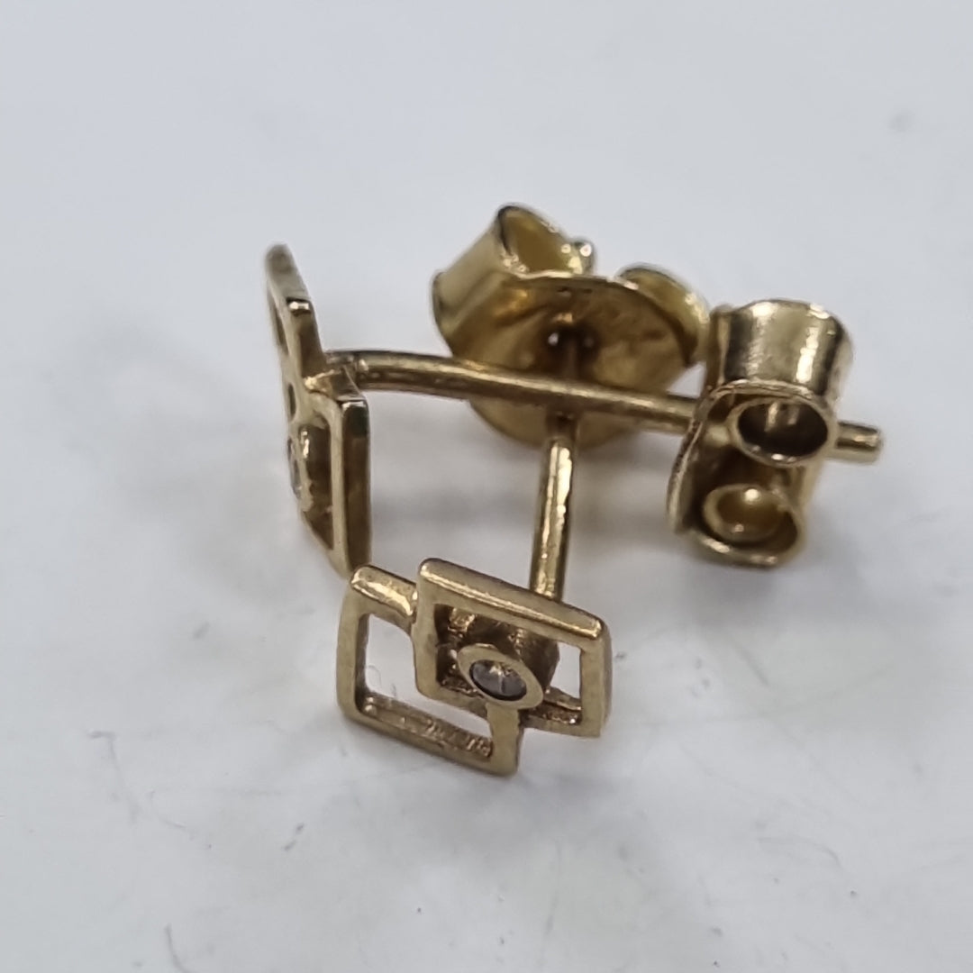 10477BRO00000B1808 FRD12 BROQUEL DE CUADRADOS CON UNA CIRCONIA ORO 14K 0.8GRS (NUEVO)