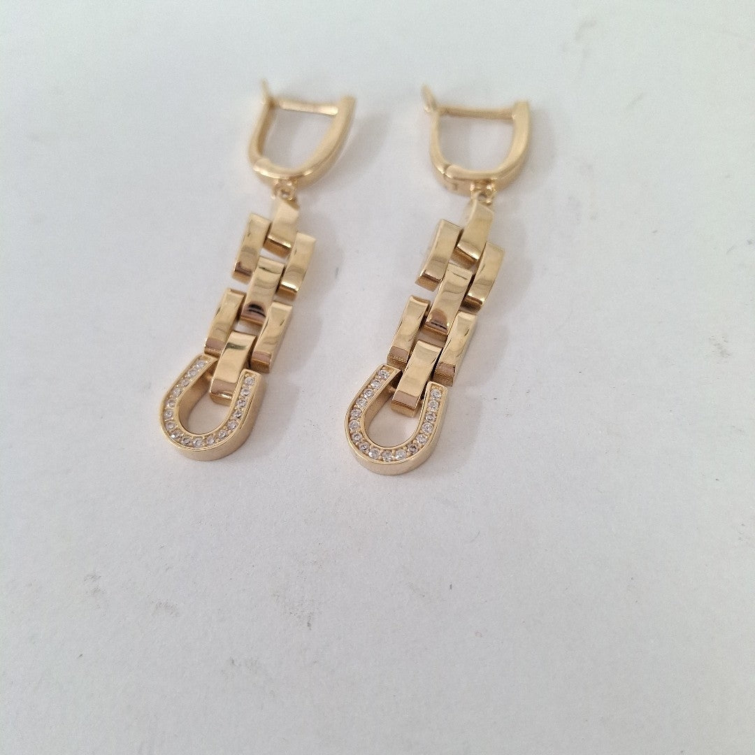 BROQUELES ORO 14K 7.1 (NUEVO)