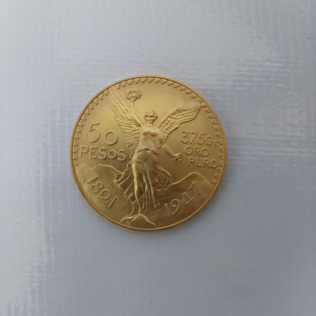 K1 41.6 GRMS - DESC.  0 GRAMOS - 21 K - AVALÚO  76377.6 * * IDENTIFICACIÓN  MONEDA NOMINATIVA. * MONEDAS PESOS  50 PESO (SEMINUEVO)