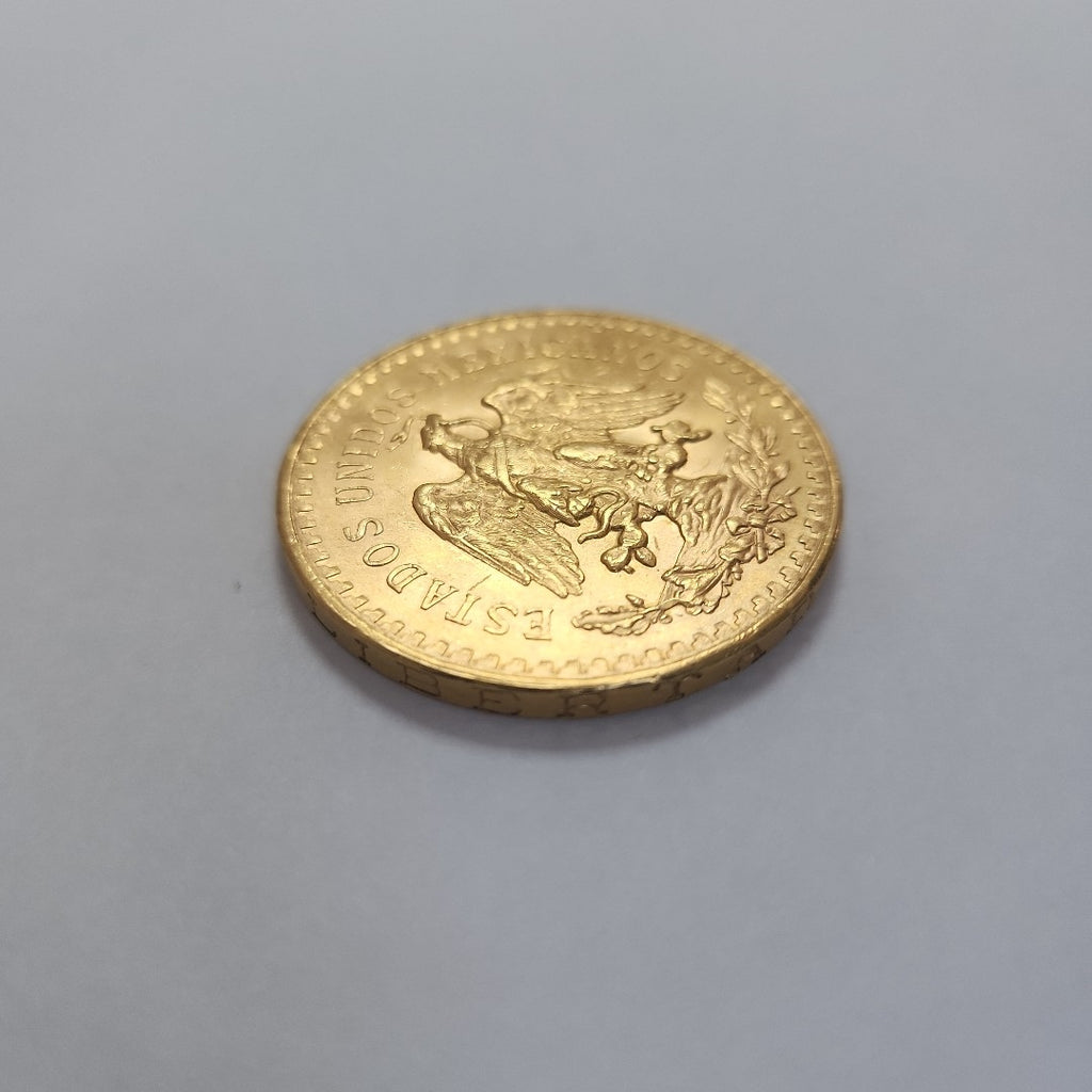K1 41.6 GRMS - DESC.  0 GRAMOS - 21 K - AVALÚO  77688 * * IDENTIFICACIÓN  MONEDA NOMINATIVA. * MATERIALES  ORO. * CANTI (SEMINUEVO)