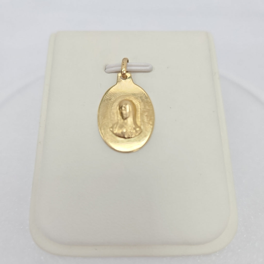 10007REL12000B120 FRD3 MEDALLA OVALADA CON IMAGEN DE LA VIRGEN AL RELIEVE ORO 14K 1.2GRS (NUEVO)