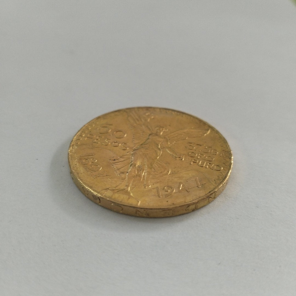 K1 41,60 GRMS - DTO. 0,00 GRMS - 21 K - AVALÚO 76003,20 * IDENTIFICACIÓN  MONEDA NOMINATIVA * MONEDAS PESOS  50 PESOS (SEMINUEVO)