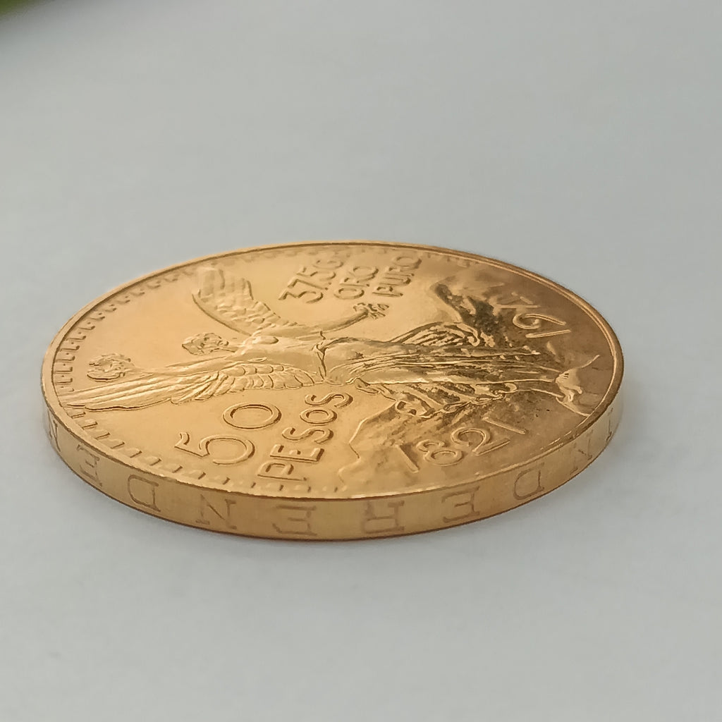 K1 41.6 GRMS - DESC.  0 GRAMOS - 21 K - AVALÚO  76377.6 * * IDENTIFICACIÓN  MONEDA NOMINATIVA. * MONEDAS PESOS  50 PESO (SEMINUEVO)