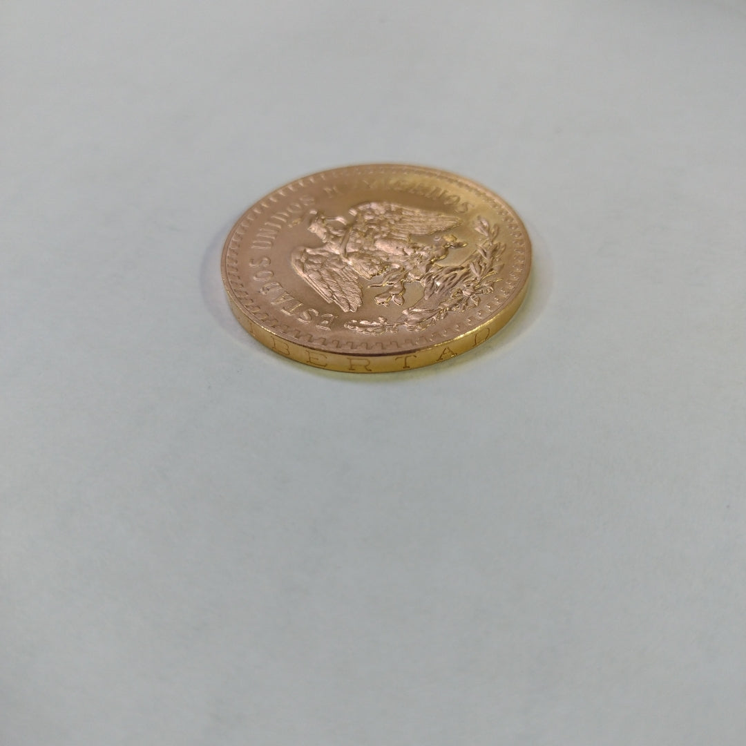 K1 41,60 GRMS - DTO. 0,00 GRMS - 21 K - AVALÚO 77126,40 * IDENTIFICACIÓN  MONEDA NOMINATIVA * MATERIALES  ORO * ESPECI (SEMINUEVO)