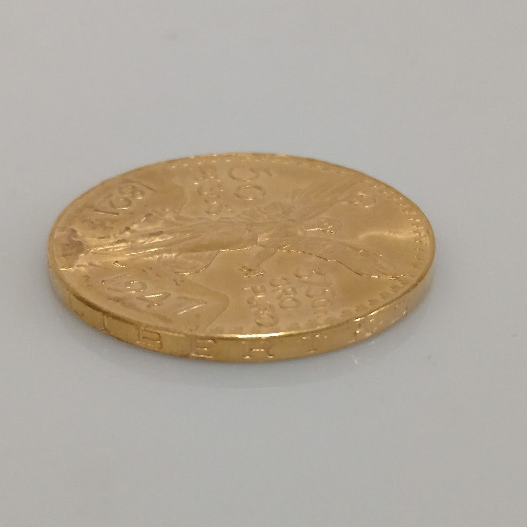K1 41,60 GRMS - DTO. 0,00 GRMS - 21 K - AVALÚO 76003,20 * IDENTIFICACIÓN  MONEDA NOMINATIVA * MONEDAS PESOS  50 PESOS (SEMINUEVO)