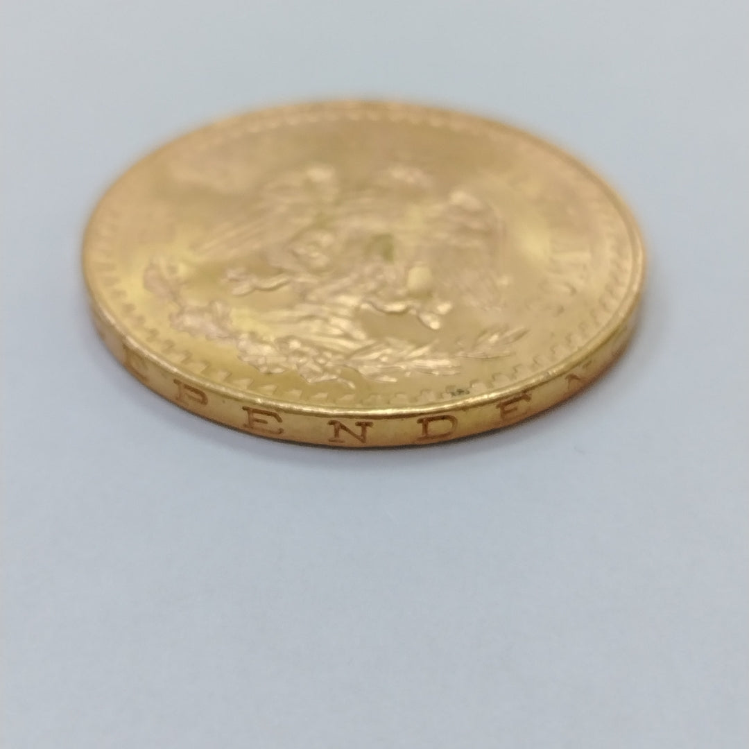 K1 41,60 GRMS - DTO. 0,00 GRMS - 21 K - AVALÚO 76003,20 * IDENTIFICACIÓN  MONEDA NOMINATIVA * MONEDAS PESOS  50 PESOS (SEMINUEVO)