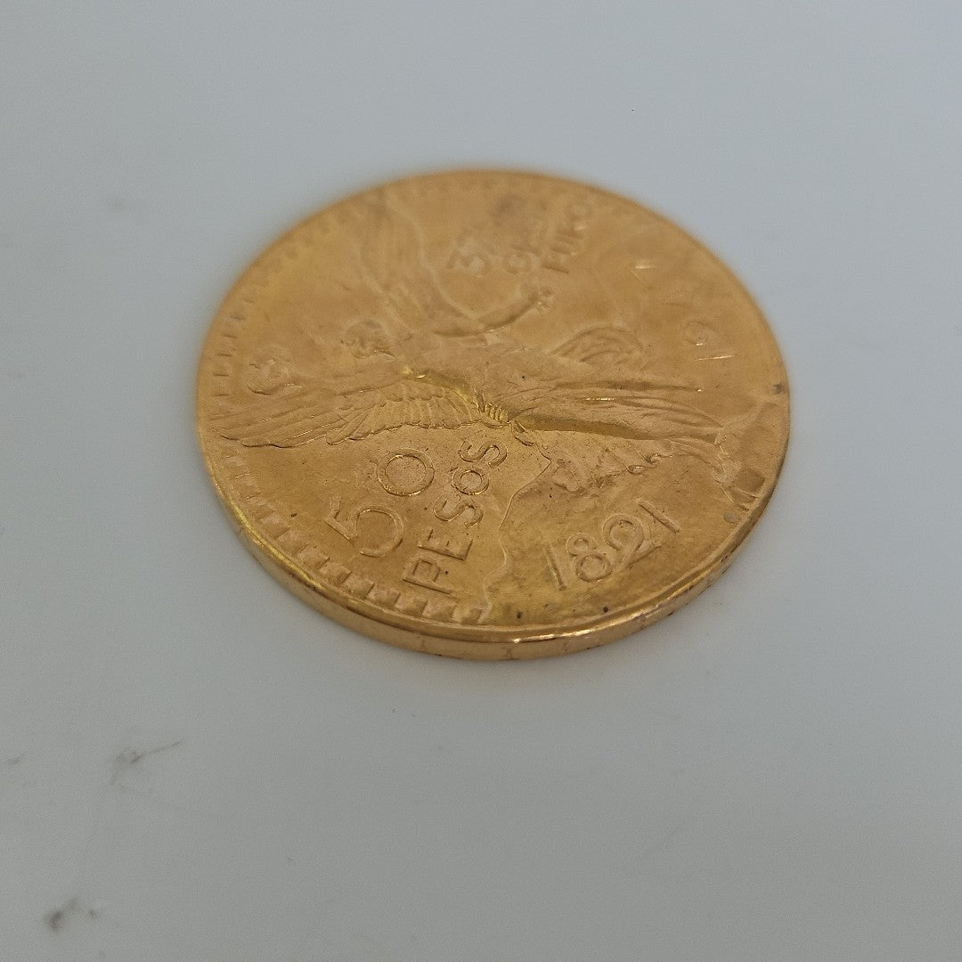 K1 41,60 GRMS - DTO. 0,00 GRMS - 21 K - AVALÚO 76003,20 * IDENTIFICACIÓN  MONEDA NOMINATIVA * MONEDAS PESOS  50 PESOS (SEMINUEVO)