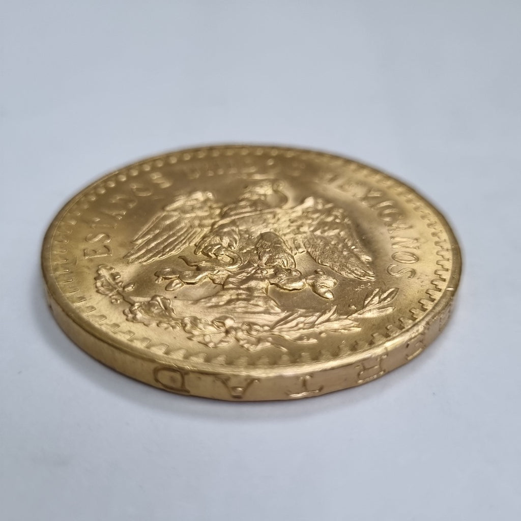 K1 41,60 GRMS - DTO. 0,00 GRMS - 21 K - AVALÚO 76003,20 * IDENTIFICACIÓN  MONEDA NOMINATIVA * MONEDAS PESOS  50 PESOS (SEMINUEVO)