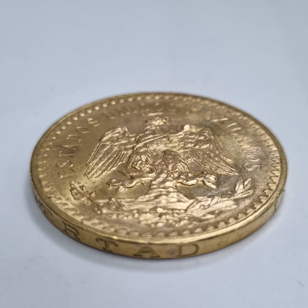 K1 41,60 GRMS - DTO. 0,00 GRMS - 21 K - AVALÚO 76003,20 * IDENTIFICACIÓN  MONEDA NOMINATIVA * MONEDAS PESOS  50 PESOS (SEMINUEVO)